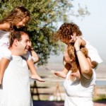 parents playing with children