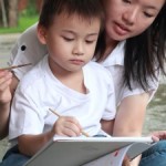 mother and son painting