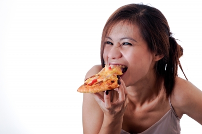 girl eating pizza