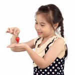 child eating fruit